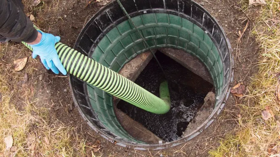 A septic tank being pumped